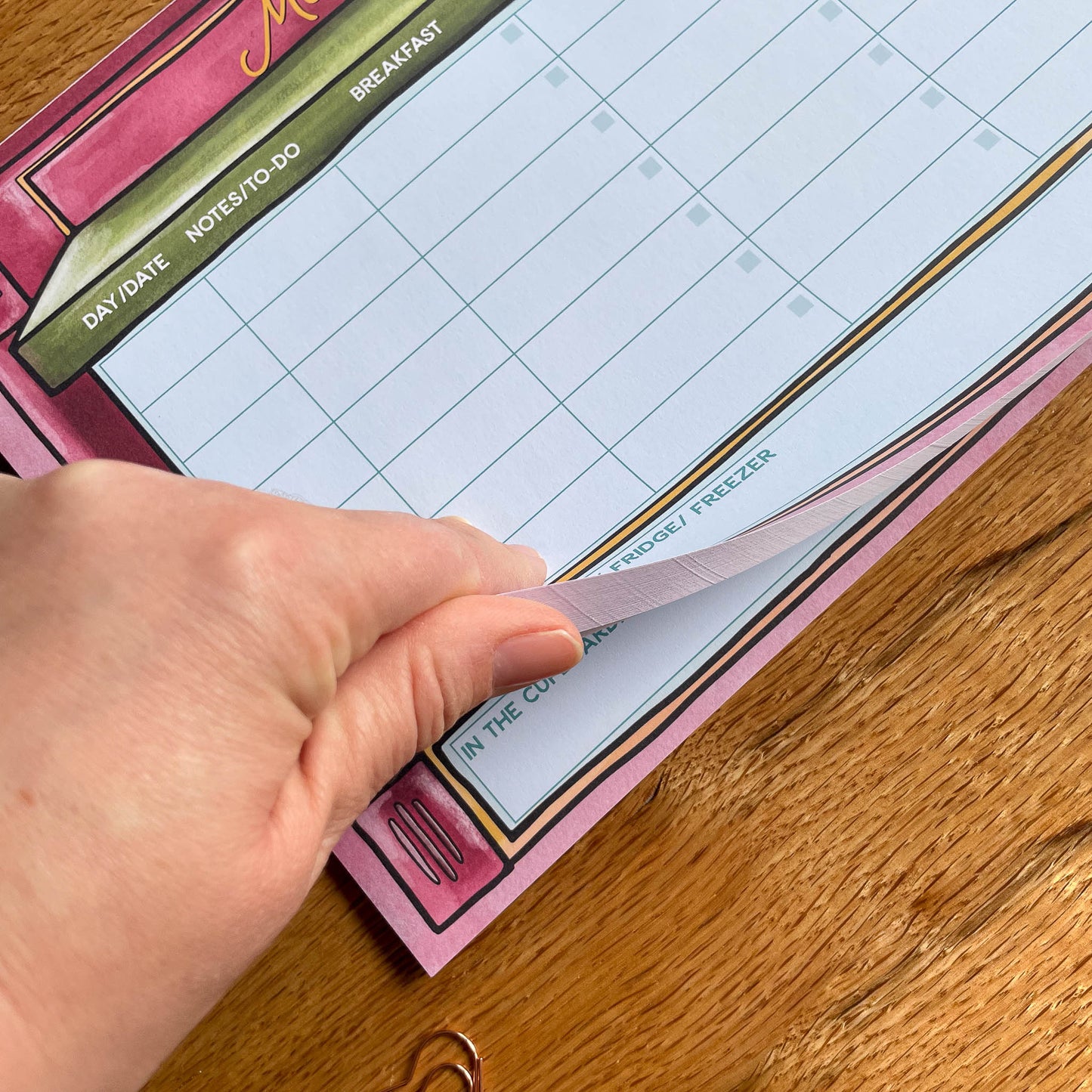 A practical image of the Meal Planner pad, designed to help you reduce the mental load by providing a structured layout for planning your meals throughout the week.