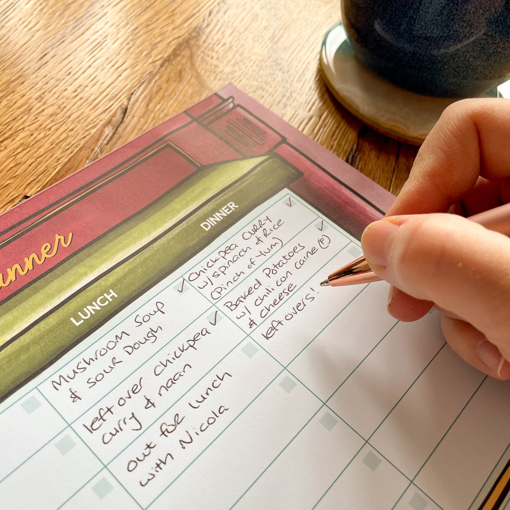 An eye-catching photo of the Meal Planner pad, showcasing its vibrant grocery shop design that adds a touch of visual appeal to your meal planning routine.