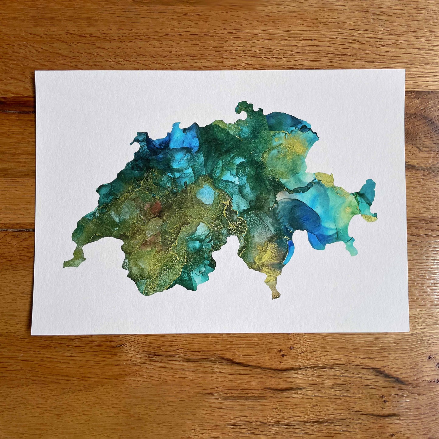 A heartfelt Swiss-themed gift: A Giclee Print of an Abstract Ink Painting in the Shape of Switzerland, perfect for friends or family leaving Switzerland.